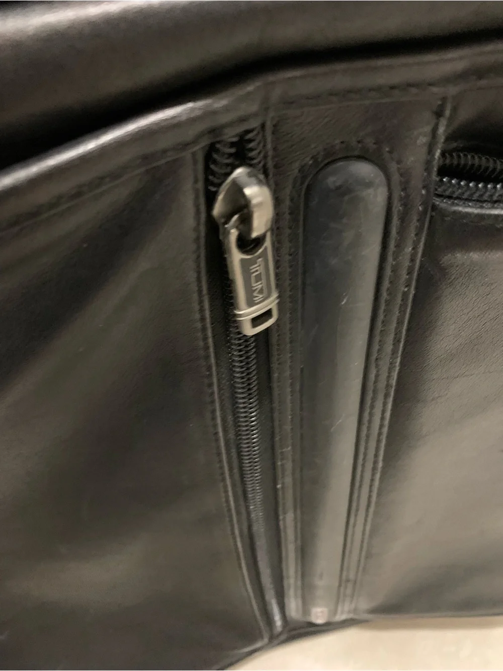 Tumi alpha leather